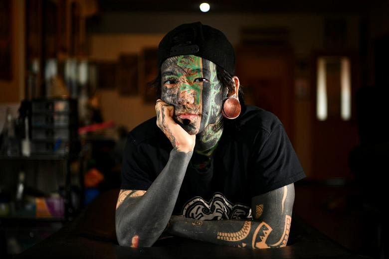 Man with full face tattoo: What have I gotten myself into?